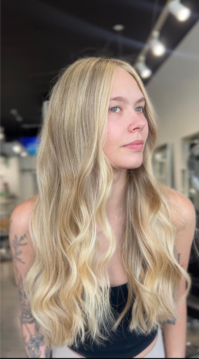 Long blended dimensional hair by Fort Lauderdale extension specialist Jasmine Reyes